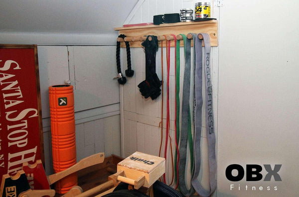 OBX, OBX Fitness, OMOIBOX, wood, wooden, custom, home gym, rogue fitness, best, portable, Personalized, Multi-Purpose, Gym Shelf, Hanger, Gym Wall Organizer, Storage Rack, Resistance Bands, Lifting Belts, Chains, Jump Ropes, gym wall shelf, Belt and Band Hanger, Titan Depth, Rogue, wall mount, Resistance Band, Gym Band Storage, Storage Rack, wall storage, wall rack, wall organizer, Lifting belt storage
