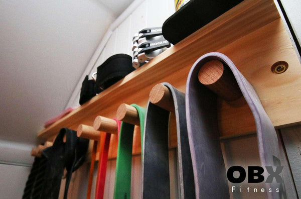 OBX, OBX Fitness, OMOIBOX, wood, wooden, custom, home gym, rogue fitness, best, portable, Personalized, Multi-Purpose, Gym Shelf,  Hanger, Gym Wall Organizer, Storage Rack, Resistance Bands, Lifting Belts, Chains, Jump Ropes, gym wall shelf, Belt and Band Hanger, Titan Depth, Rogue, wall mount, Resistance Band, Gym Band Storage, Storage Rack, wall storage, wall rack, wall organizer, Lifting belt storage  