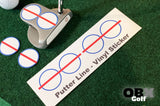 A set of six golf putter alignment stickers. Two stickers are pre-cut circles and four stickers are uncut circles. The stickers have a red center line on them.