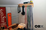 OBX, OBX Fitness, OMOIBOX, wood, wooden, custom, home gym, rogue fitness, best, portable, Personalized, Multi-Purpose, Gym Shelf,  Hanger, Gym Wall Organizer, Storage Rack, Resistance Bands, Lifting Belts, Chains, Jump Ropes, gym wall shelf, Belt and Band Hanger, Titan Depth, Rogue, wall mount, Resistance Band, Gym Band Storage, Storage Rack, wall storage, wall rack, wall organizer, Lifting belt storage  
