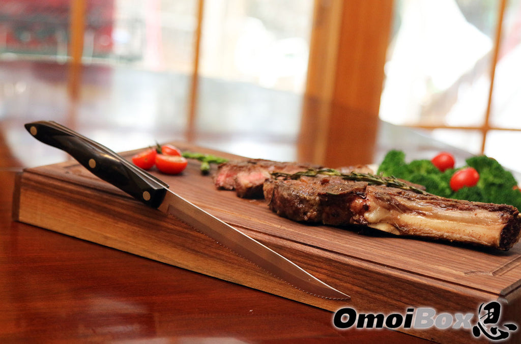 steak knife magnetically holding on steak serving board